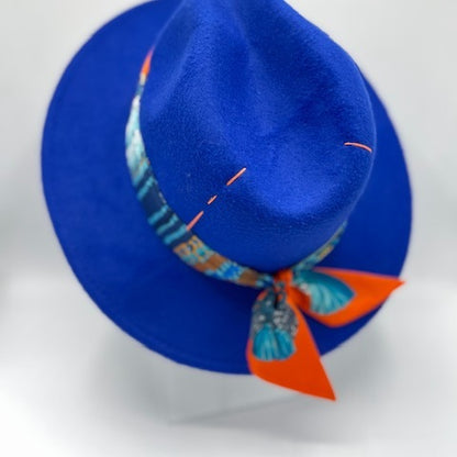 Royal blue fedora with orange details