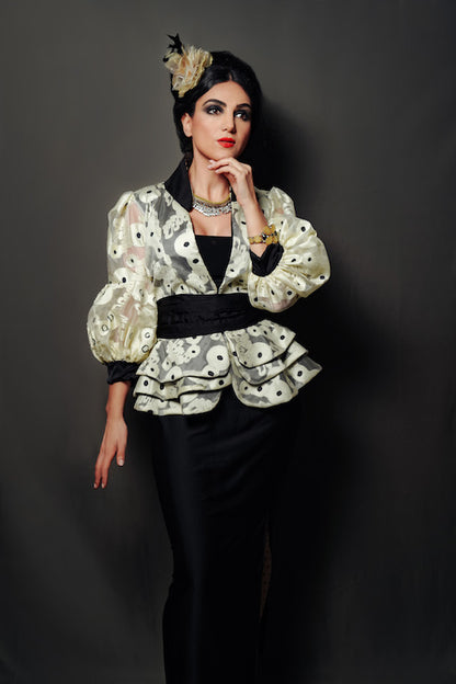 Short layered taffeta jacket with silk satin collar, pleated belt, and inner lining with silk satin pencil skirt.