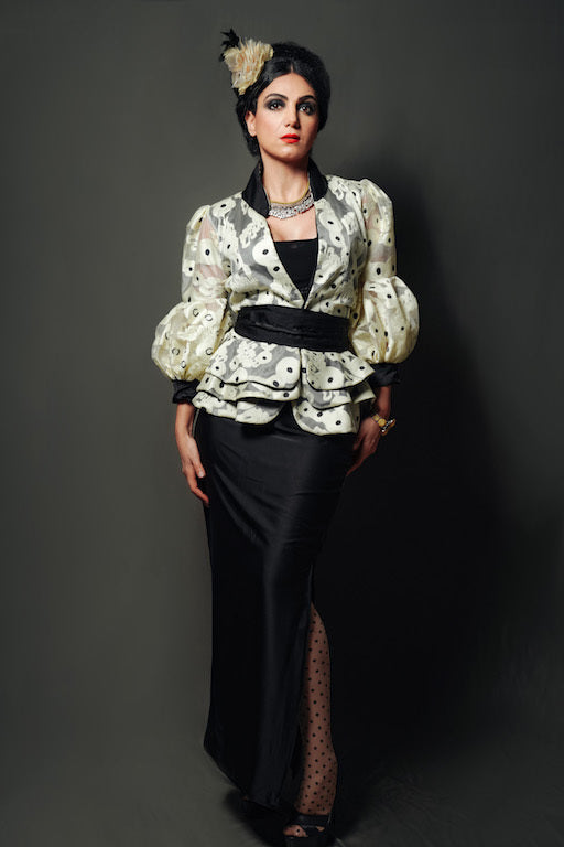 Short layered taffeta jacket with silk satin collar, pleated belt, and inner lining with silk satin pencil skirt.