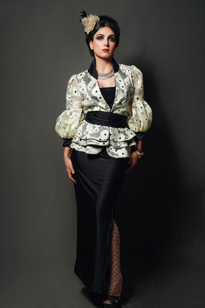 Short layered taffeta jacket with silk satin collar, pleated belt, and inner lining with silk satin pencil skirt.