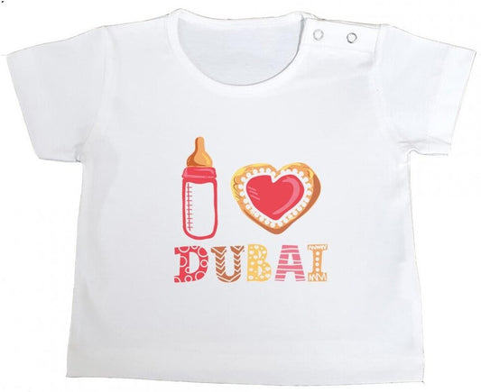 Soft Baby T-Shirt with neck buttons. 100% cotton, machine washable. I Heart Dubai Design Pink.  Size 6-12months