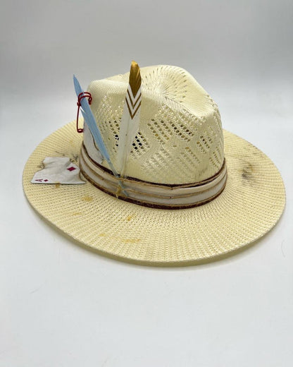 Straw summer hat with feathers