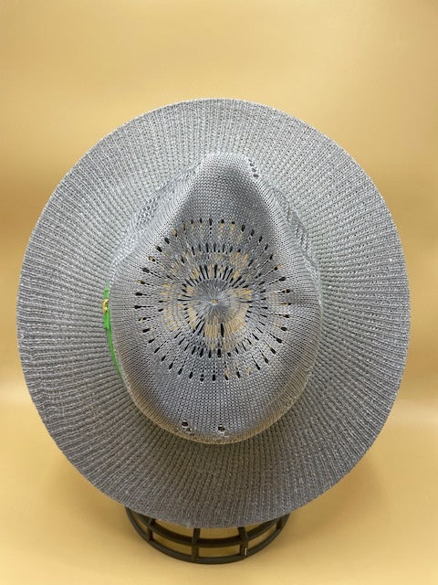 Straw summer hat with green band and pineapple accessory