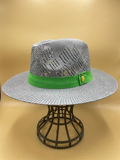 Straw summer hat with green band and pineapple accessory