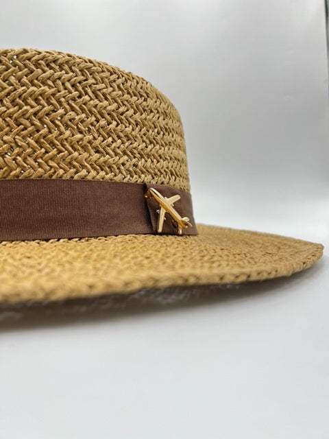 Summer paper straw with brown accessories and airplane