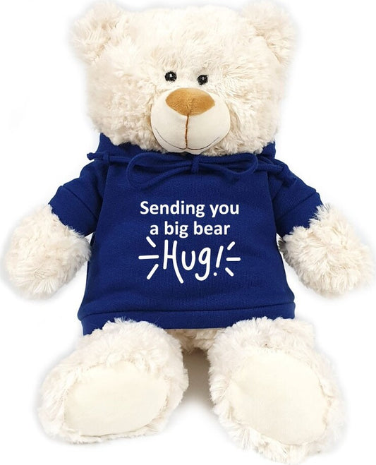 Supersoft, cuddly cream bear with trendy blue hoodie Sending You A Big Bear Hug ! Size 38cm. Ideal for celebrations, love messages, Valentine's Day, s