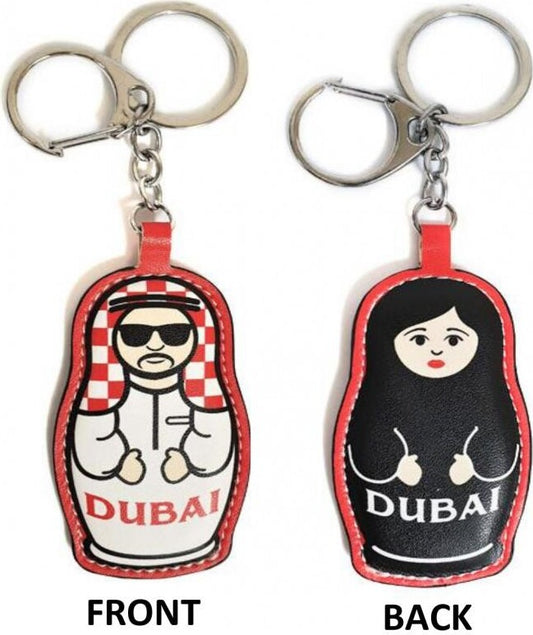 Trendy  Key chain/ key ring/ tree ornament. Arabian couple featuring man one side and lady the other. Super smooth touch PU fabric.  Size: 7.5cm