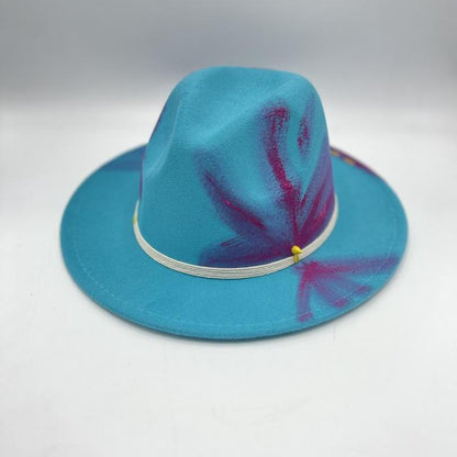 Turquoise fedora with fuchsia drawing