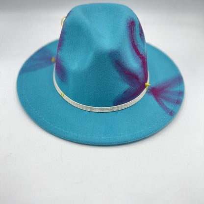 Turquoise fedora with fuchsia drawing