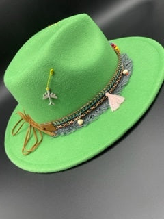 Vibrant green fedora with plane accessory