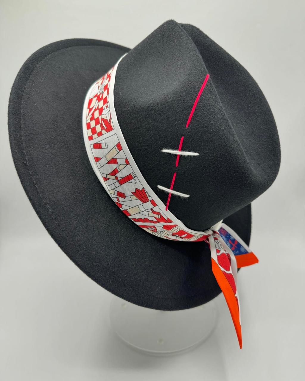 Black fedora with white and red details