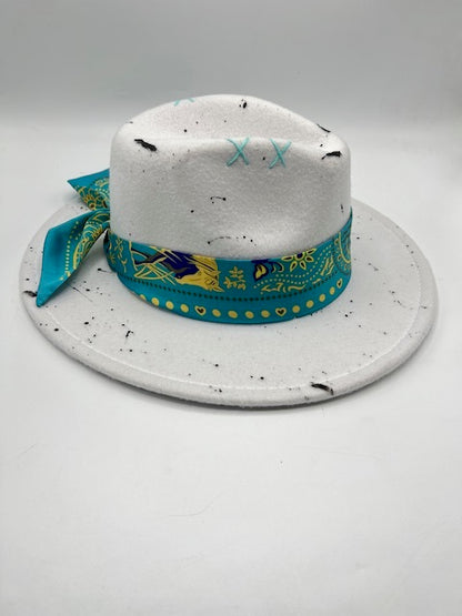 White fedora with blue bandana and splashes