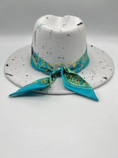 White fedora with blue bandana and splashes