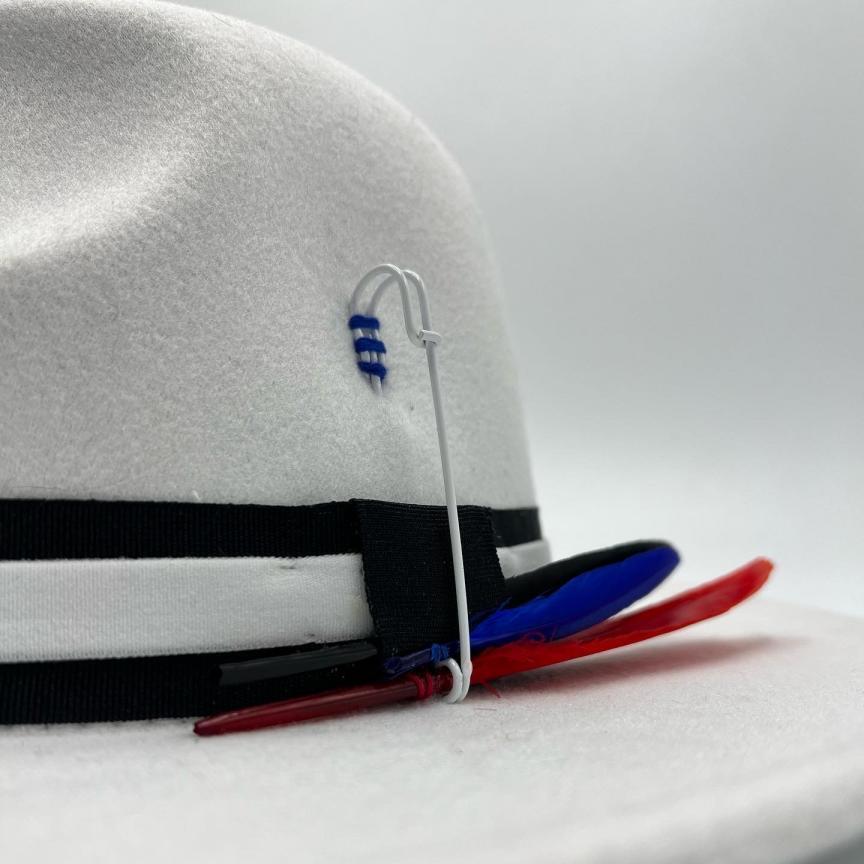 White fedora with red and blue details