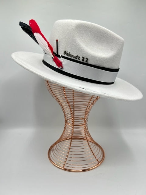 White fedora with red details