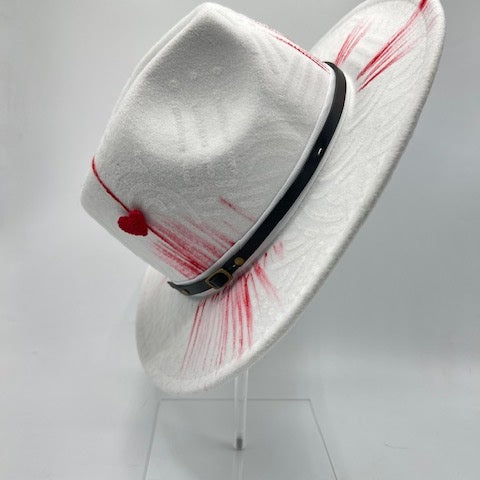 White hand drawn fedora with hearts