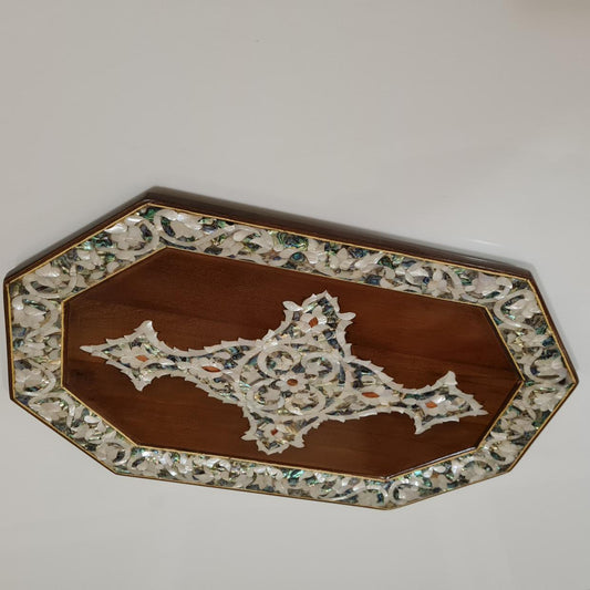 Wooden tray with seashell