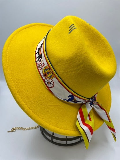 Yellow fedora with carriage scarf and golden chain