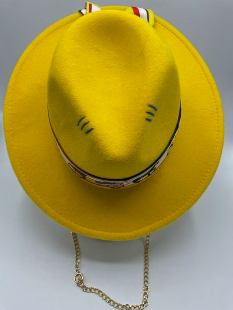 Yellow fedora with carriage scarf and golden chain