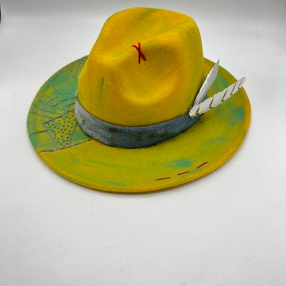 Yellow fedora with turquoise details